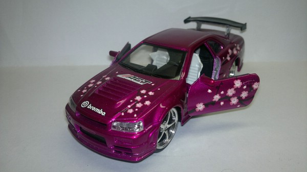 Nissan Skyline GTR 34 (Saico) [1999г., Розовый металлик, 1:32]