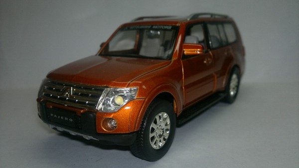 Mitsubishi Pajero (UNI-Fortune) [1999г., Темно-оранжевый металлик, 1:32]