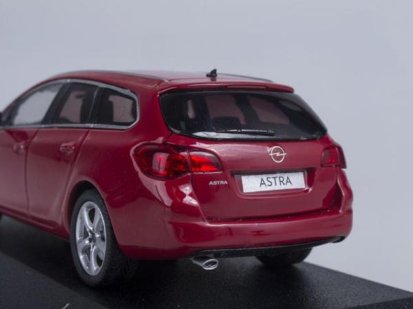 Opel Astra Sportdtourer (Minichamps) [2011г., Красный, 1:43]