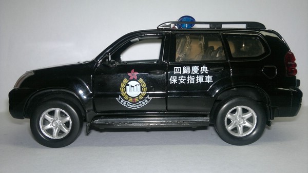 Toyota Land Cruiser Prado 120 полиция Гонконга (Неизвестный производитель) [2002г., Черный, 1:32]