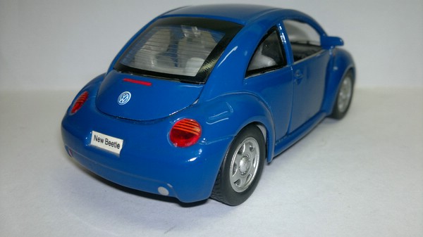 Volkswagen New Beetle (SunnySide) [1997г., Синий, 1:32]