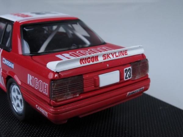 Nissan Skyline Gr.A No.23 1988 Ricoh (Ebbro) [1985г., Красный с белым, 1:43]